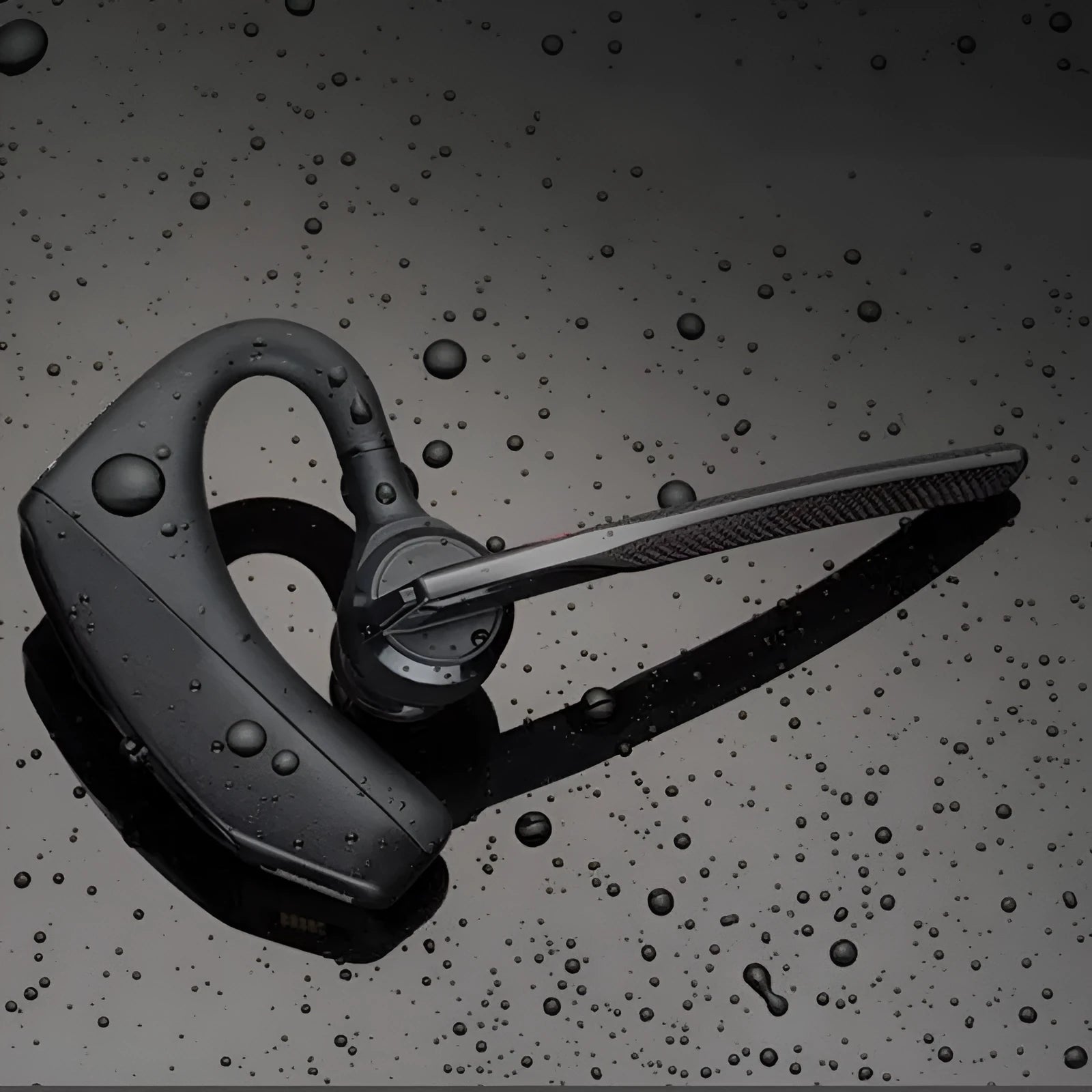 Black plastic Bluetooth sports headphones with a USB port and a visible battery level display.