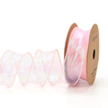 Roll of 4cm wide fishtail fringe mesh ribbon in Illusion Champagne colour.