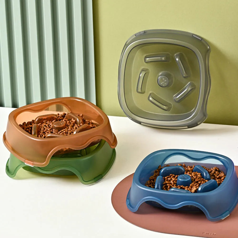 Blue plastic dog slow feeder anti-choking bowl on a white background.