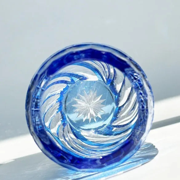 Blue cut crystal glass cup 80x190mm with Japanese-Jianghu style on a table