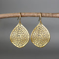 Gold retro-style drop pendant earrings with a hollow leaf design.