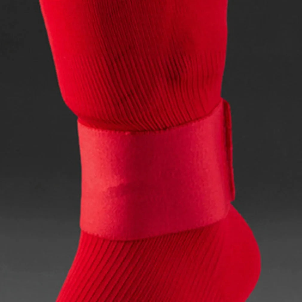 Red rubber shin guard magic tape belt for football and cycling sports, shown at 25cm length.