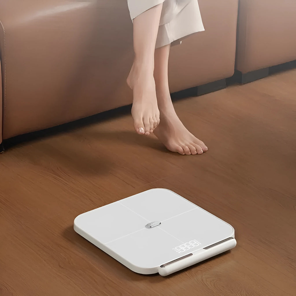 White professional 8-electrode smart body fat scale with tempered glass platform and LED display.
