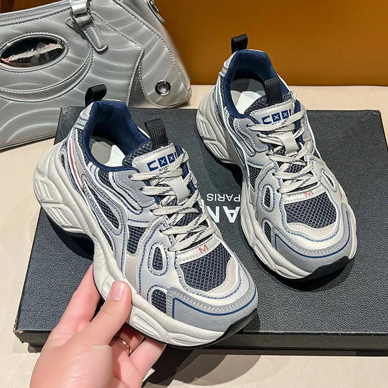 Women's casual breathable mesh board shoes in gray with thick rubber sole and front lace-up