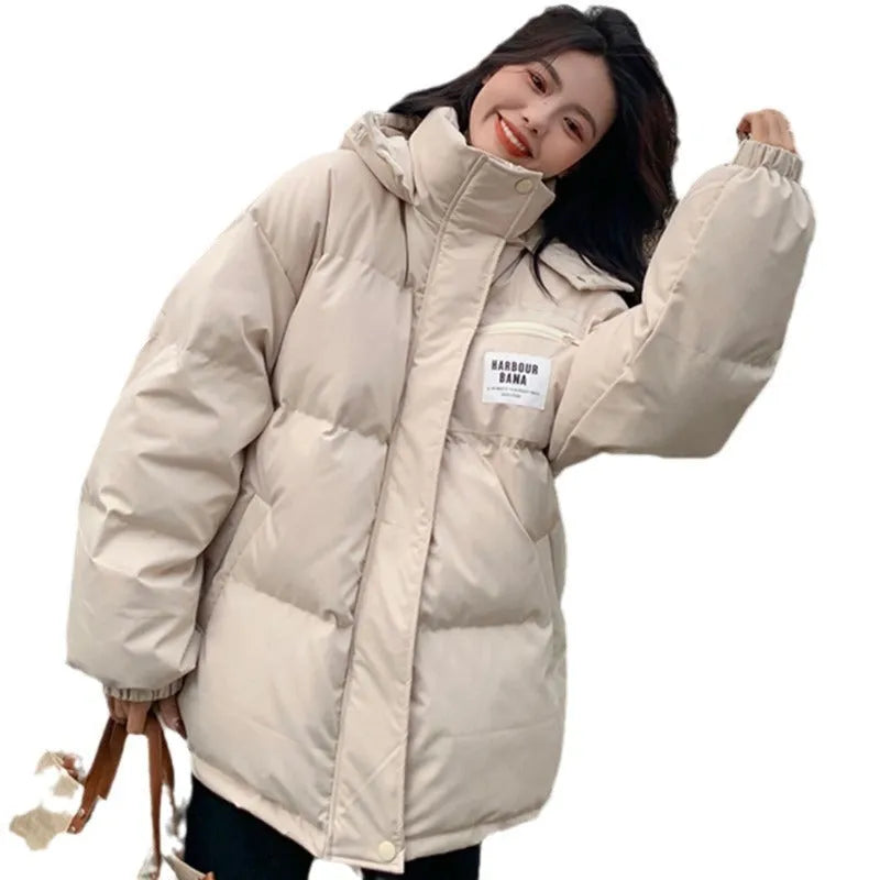 Women's Korean-style loose cropped jacket in solid colour beige, with long sleeves and contrast stitching