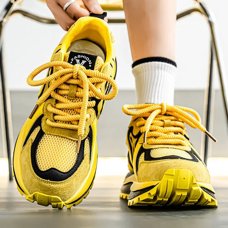 Men's casual sneakers in black, white, or yellow with mesh upper and rubber sole