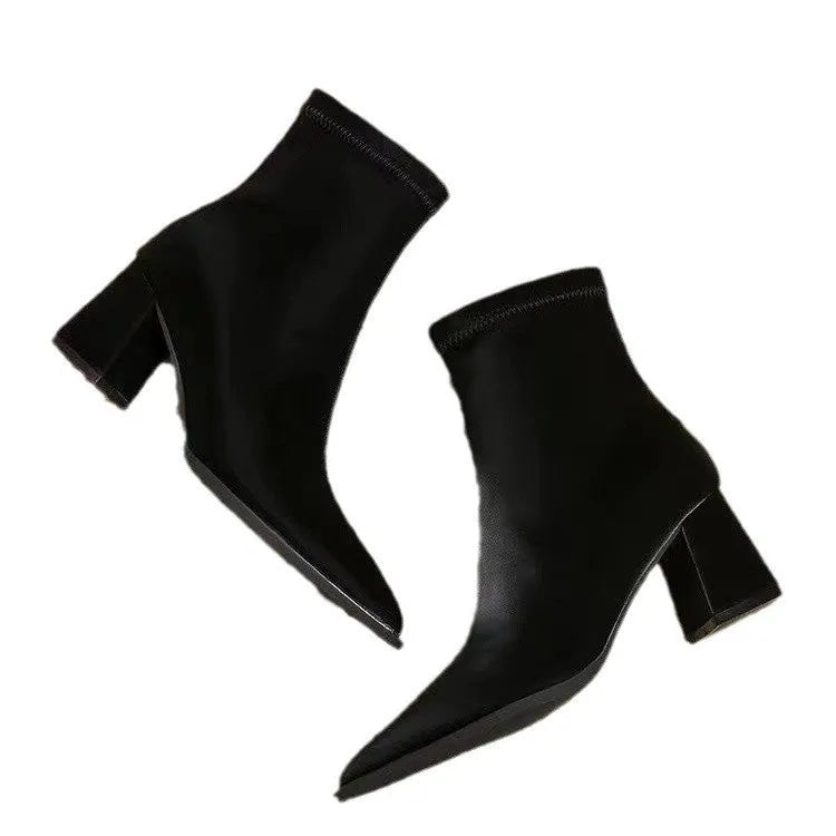 Women's khaki pointed toe fashion boots with a wedge heel on a neutral background.