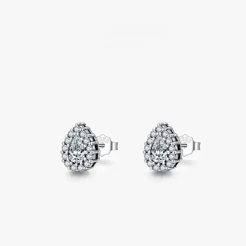 Close-up of a women's sterling silver drop ear stud with a polished finish and diamond-treated detail.
