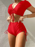 Lady lace-up bow swimsuit set with matching shorts in dark green colour