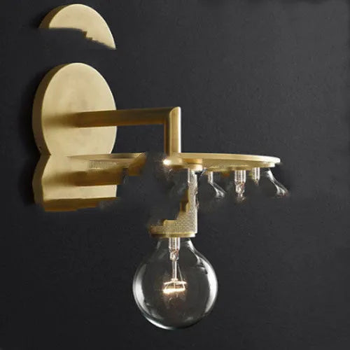Modern wrought iron glass wall lamp with gold bronze finish and triangular transparent glass shade