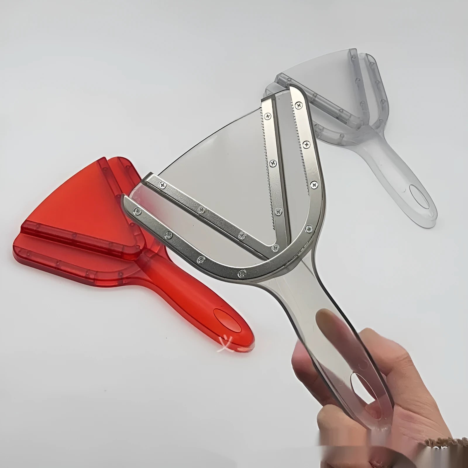Adjustable telescopic can opener and bottle opener tool in red plastic with non-slip handle.