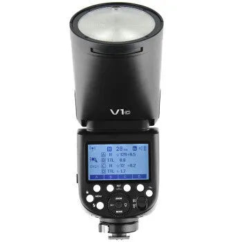 Black DSLR overhead flash with circular lamp head on mini base, with lithium battery and accessories for studio photography