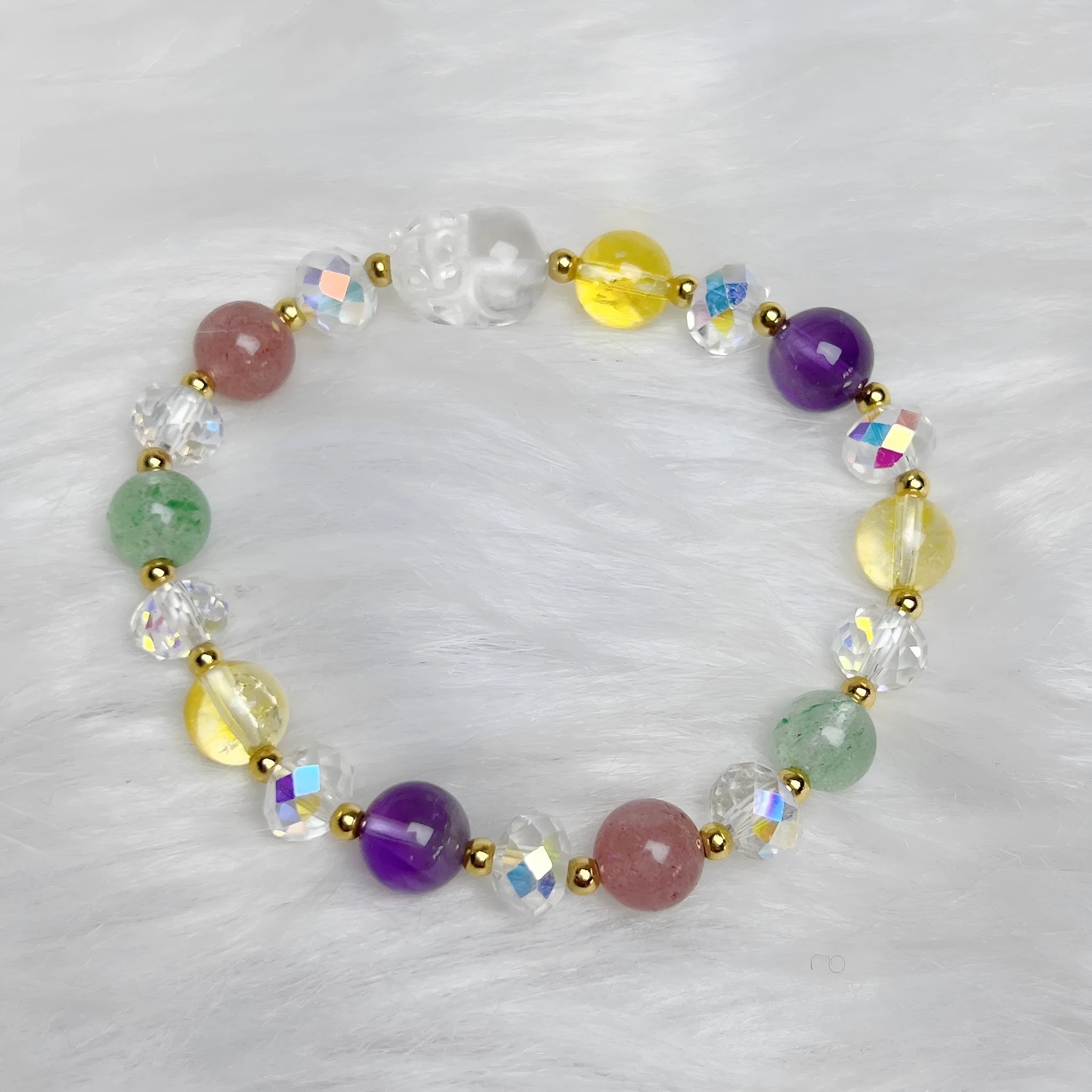 Handcrafted crystal bracelet featuring combined phoenix and nine-tail fox animal motifs