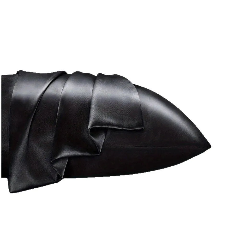 A pair of solid colour satin pillowcases made from polyester fibre, shown in one of 13 available colours.