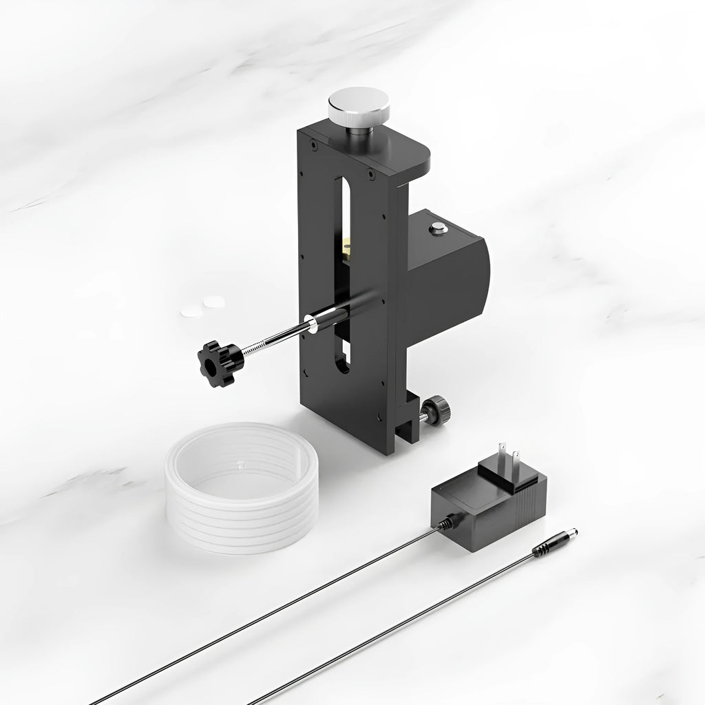 Compact benchtop ultrasonic cleaning machine for vinyl records and electronic boards.