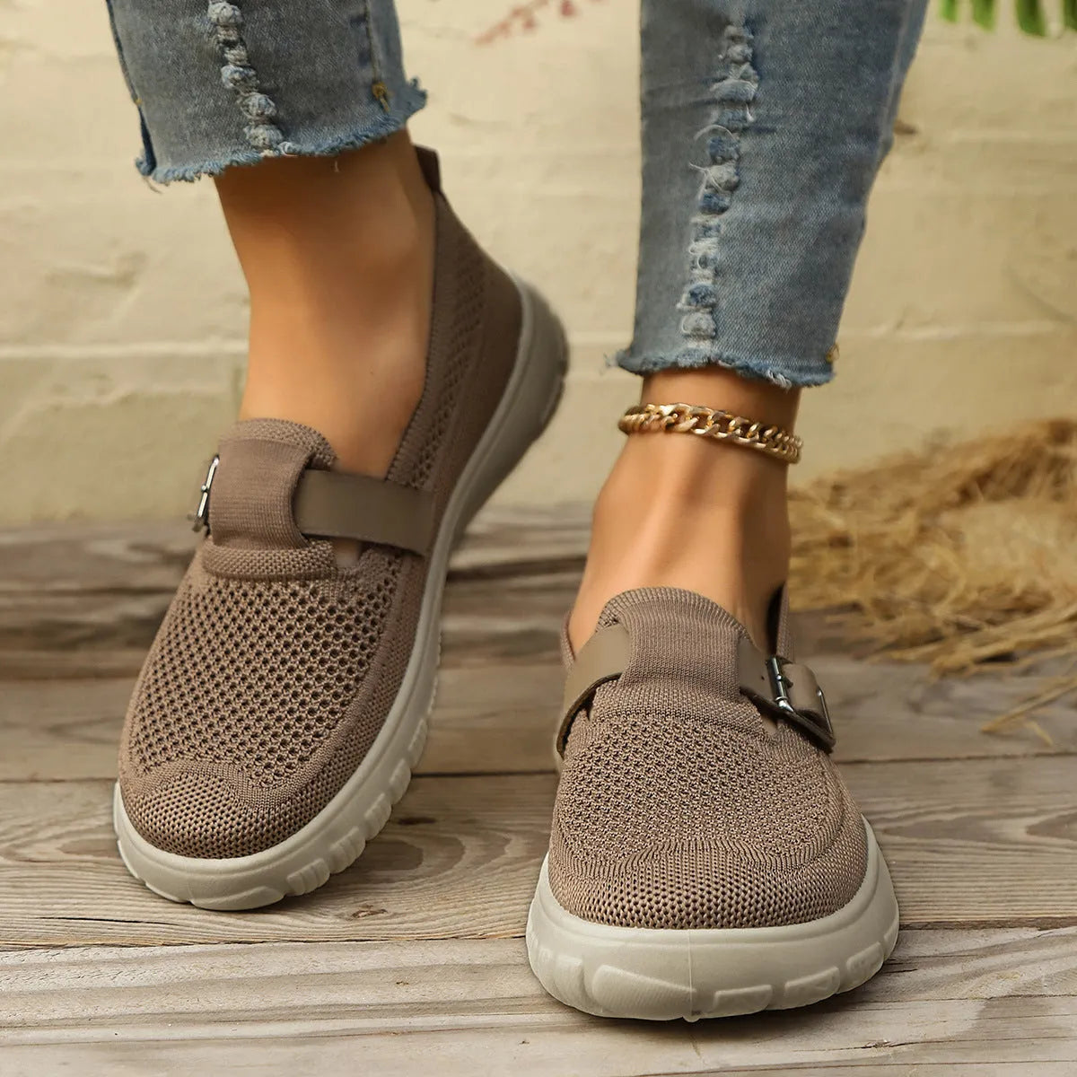 Slip-on sneaker with Flyknit upper, mid-top wedge heel, available in beige, black, brown
