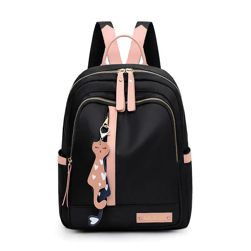 Black square nylon casual backpack with double shoulder straps and a front pocket.