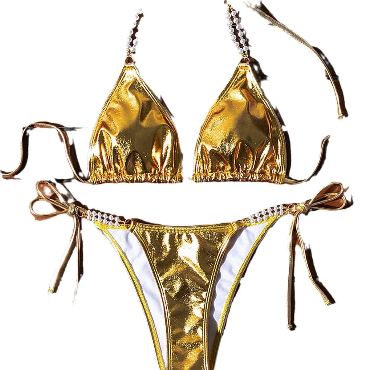 Gold halter neck bikini with lace-up front and pearl chain decoration