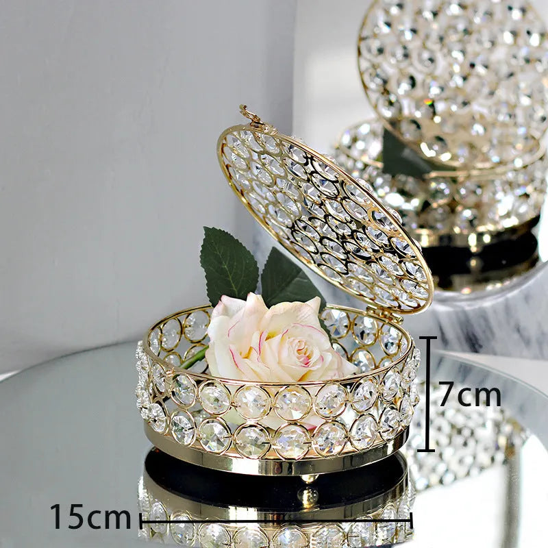Clear crystal glass jewellery storage box with a French gold-coloured metal frame.