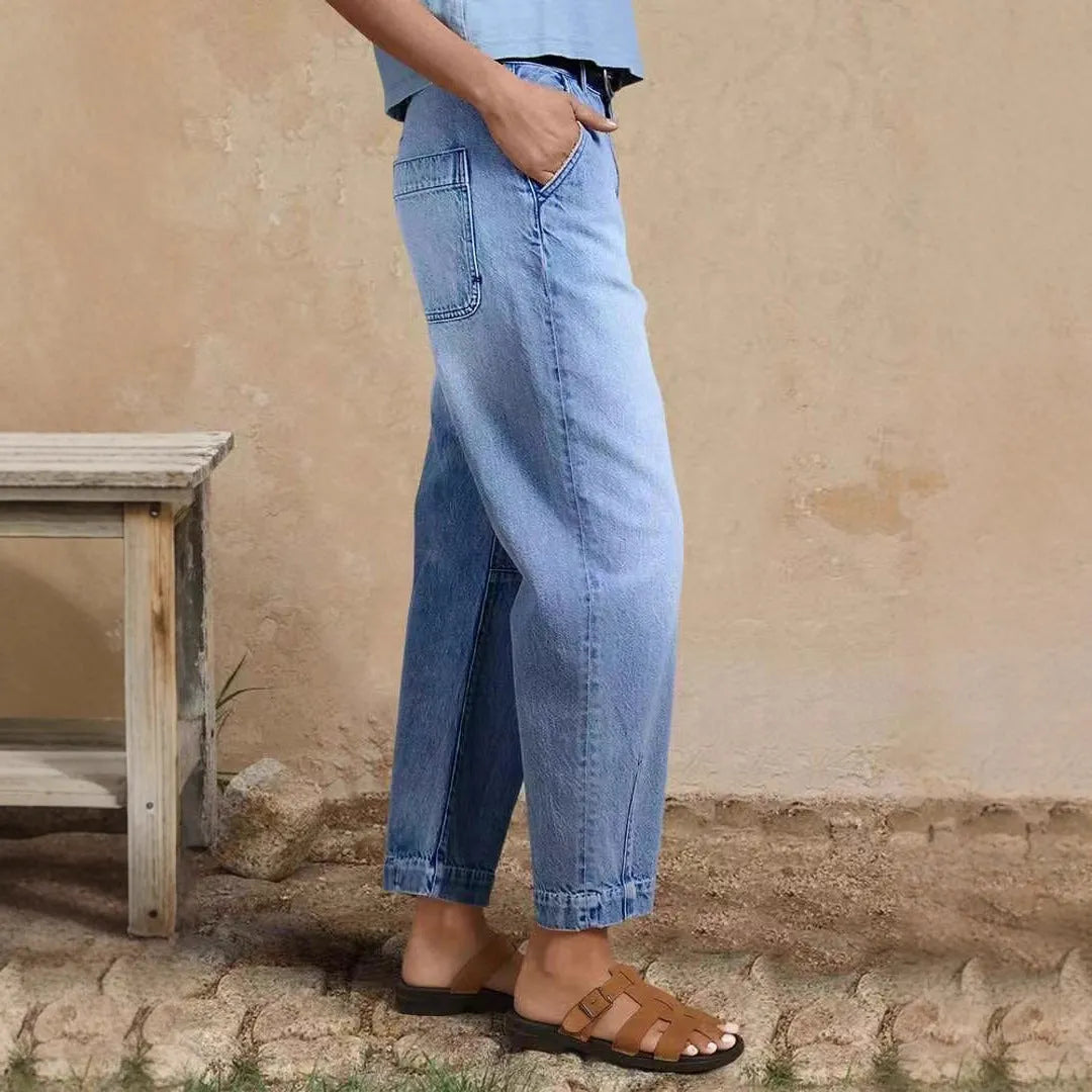 Casual loose jeans trousers in light blue denim with washed finish
