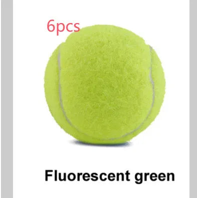 Bright pink, blue, yellow, green, and orange 6.3cm rubber tennis balls for dogs on grass.