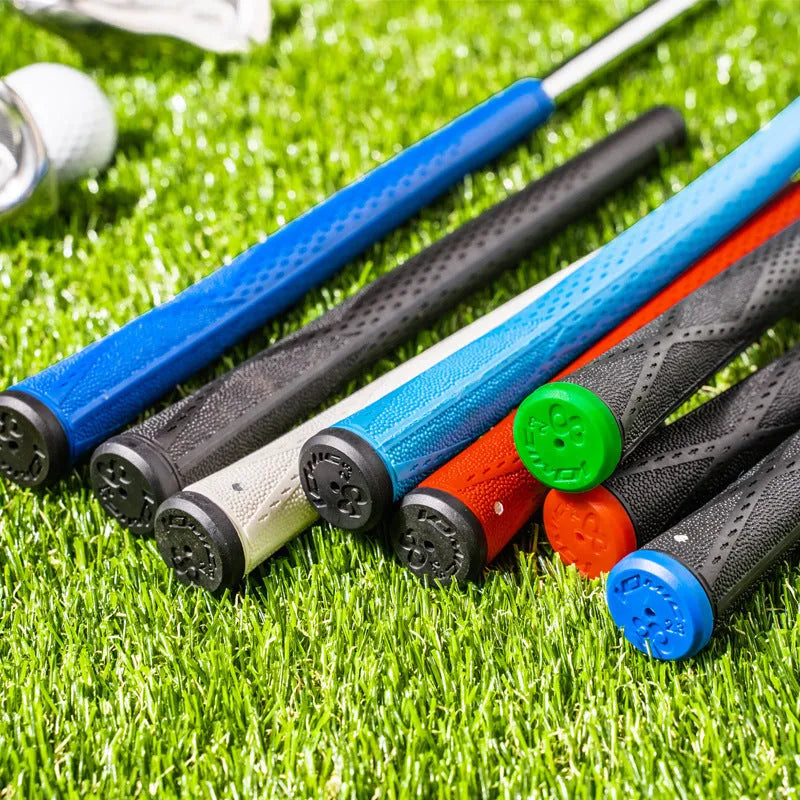 TPE golf grip in multiple colours including pink, blue, and black with red head on a club shaft