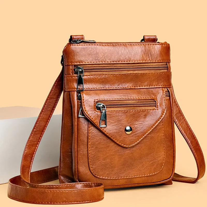 Vertical square-shaped crossbody phone bag in PU leather available in four colours