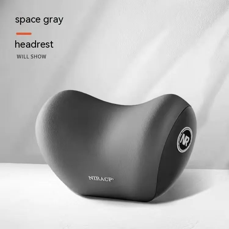 Black memory foam car headrest pillow and matching lumbar support pillow on a car seat.