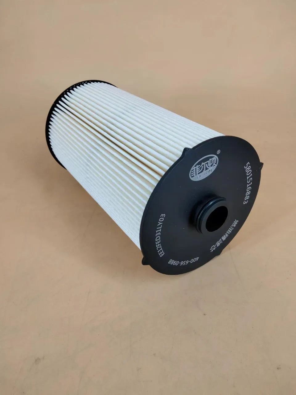 Iveco 5801516883 fuel filter component for diesel engine fuel systems.