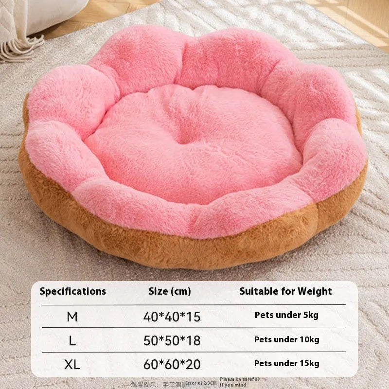 Round grey and black plush cat bed with high walls and a removable inner nest liner.