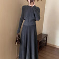 Women's dark grey knitted dress suit with 3D pattern, artistic retro style two-piece set.