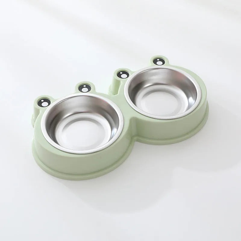 Stainless steel double compartment pet bowl for food and water on a silicone non-slip base.
