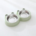 Stainless steel double compartment pet bowl for food and water on a silicone non-slip base.