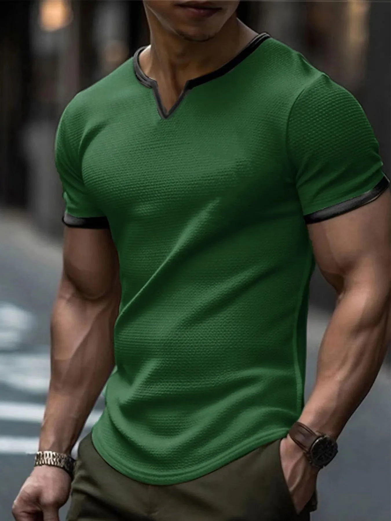 Colour-block V-neck short sleeve t-shirt in polyester waffle fabric on a neutral background.