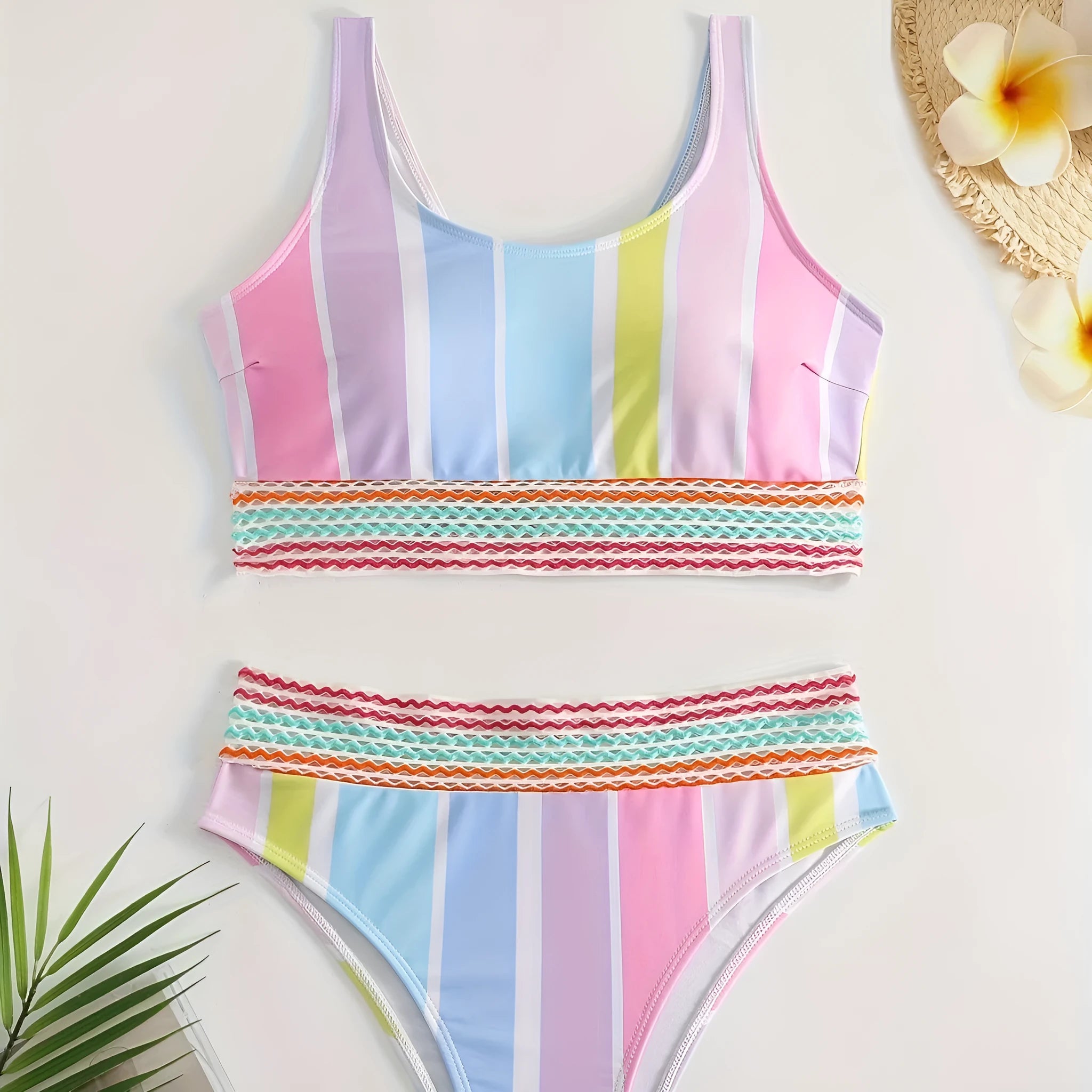 Women's striped two-piece sports bikini set in picture colour, shown for swimming.