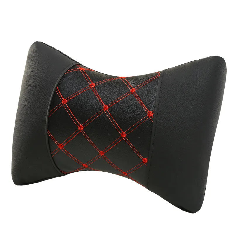 Black quilted diamond pattern car headrest neck pillow with contrasting piping options.