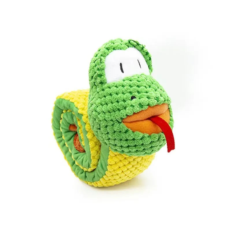 Reversible velvet squeak dog toy shaped like a snail with hidden food holes for foraging puzzles.
