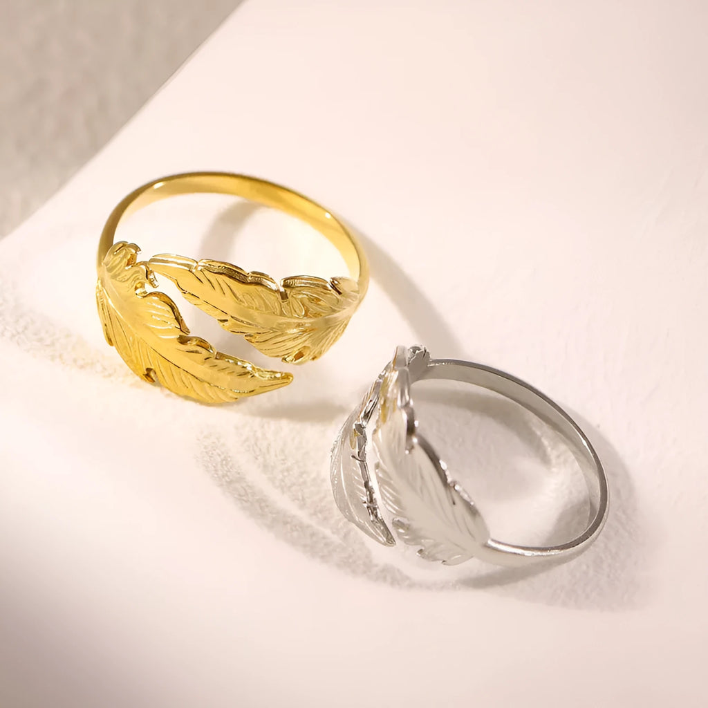 Women's adjustable feather design ring in gold and silver titanium steel options