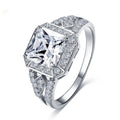 Hollow geometric zircon ring with quadrilateral detailing in platinum colour