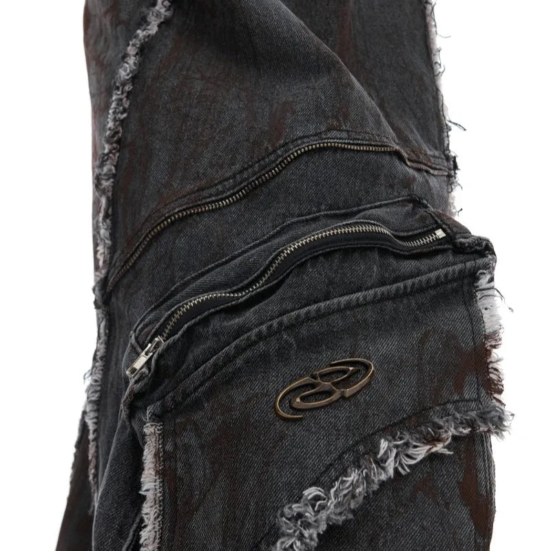 Black distressed denim coat and pants set with padded shoulders and gradient dye pattern