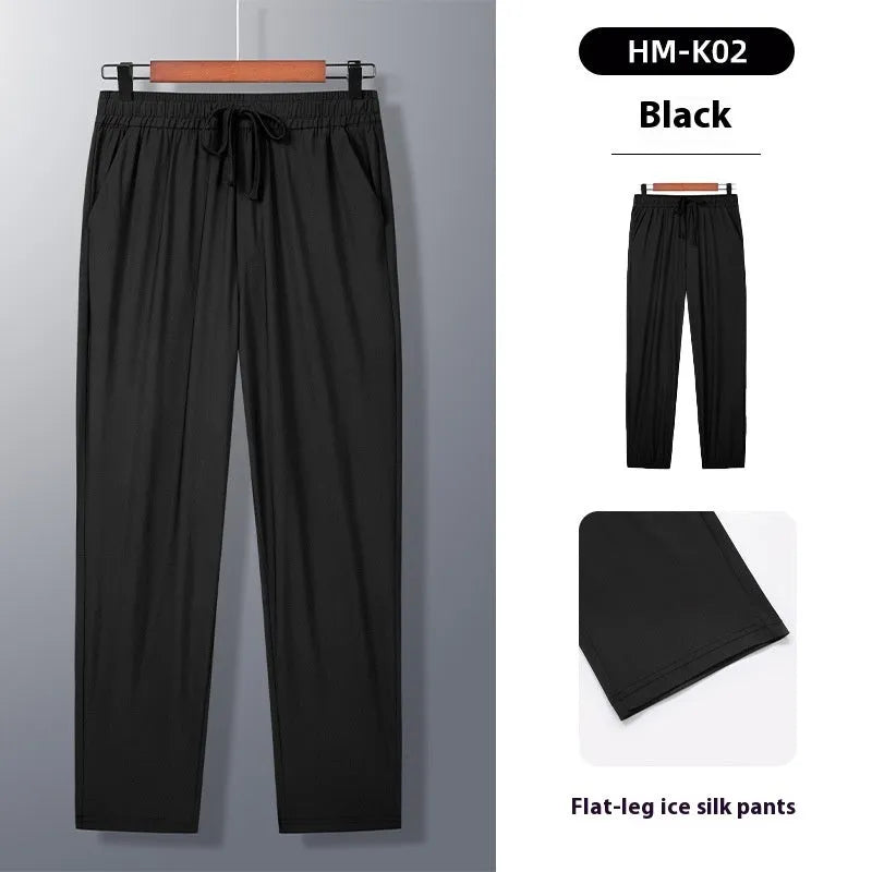 Black straight leg summer trousers with drawstring waist, made from thin ice silk blend fabric.