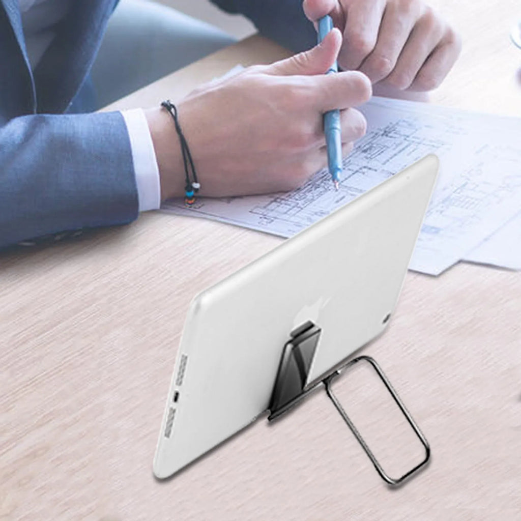 Gun black folding ring buckle phone holder attached to phone back, ring open for desktop stand