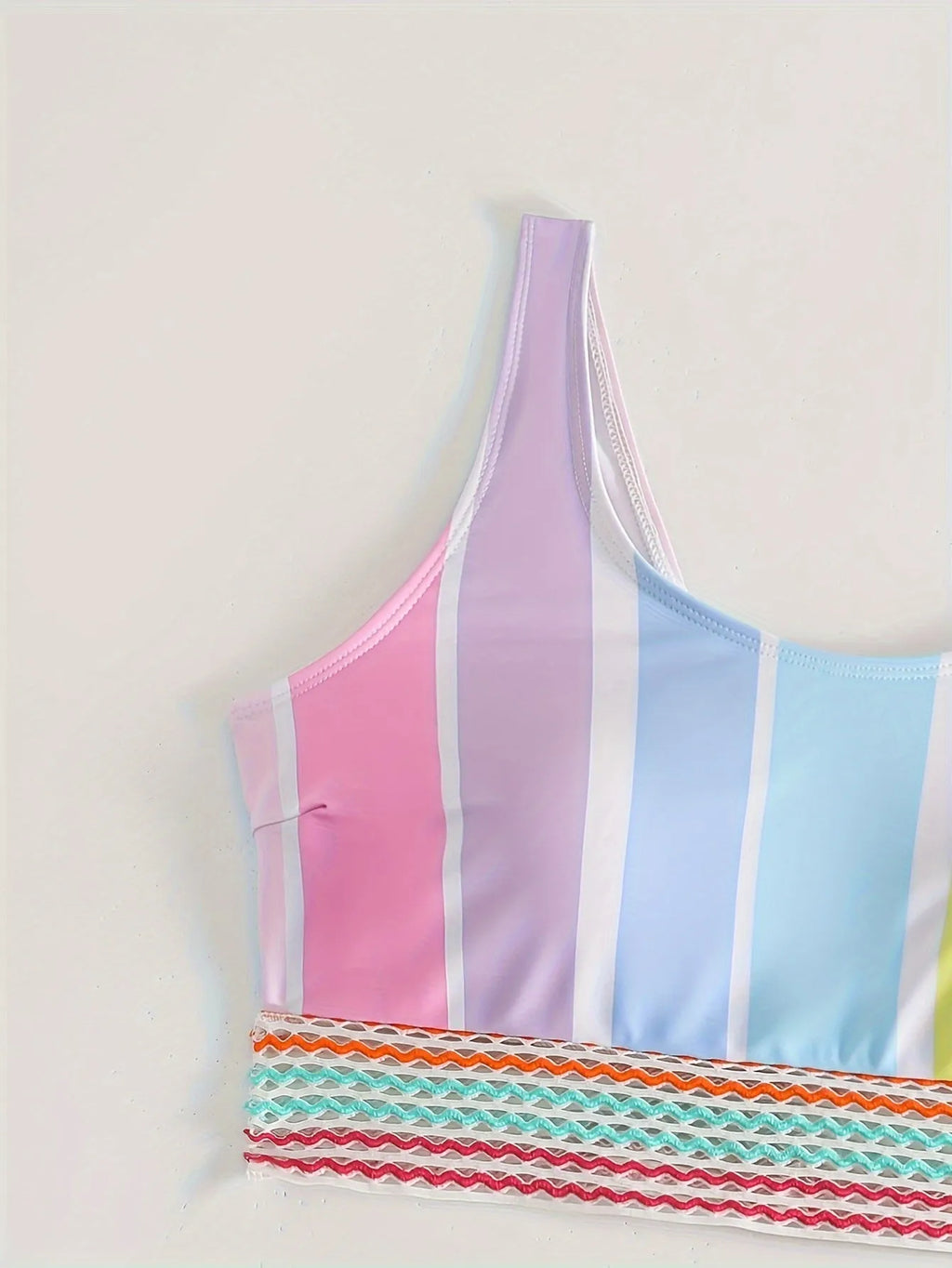 Women's striped two-piece sports bikini set in picture colour, shown for swimming.
