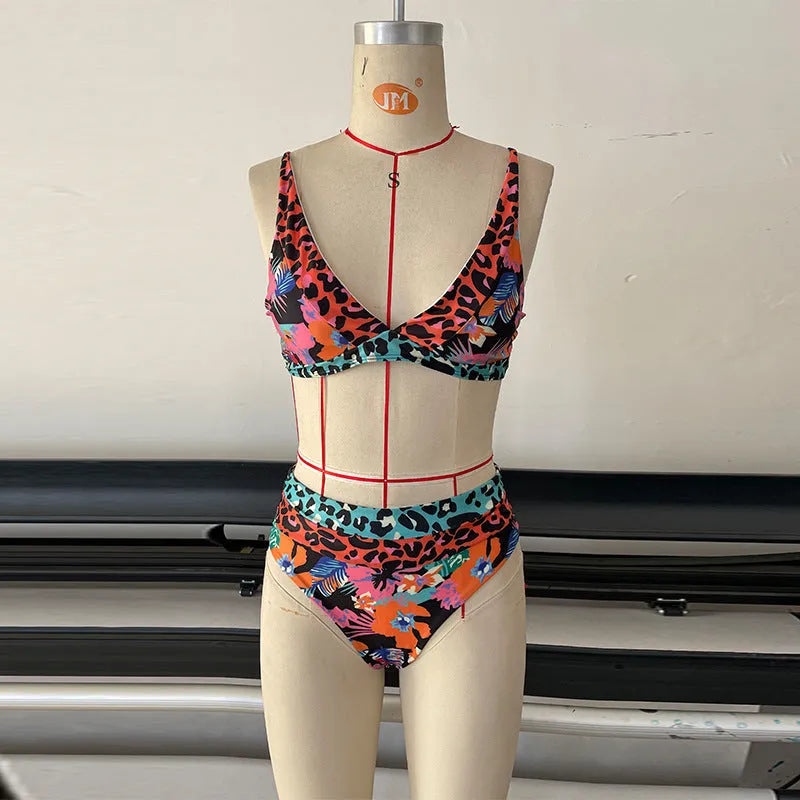 Women's floral print high waist bikini swimsuit set on a neutral background.
