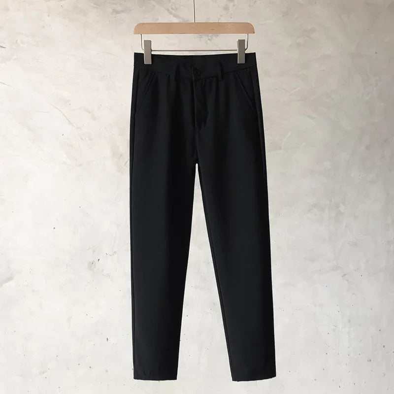 Boys slim straight wool blend trousers in neutral colours with tapered leg design