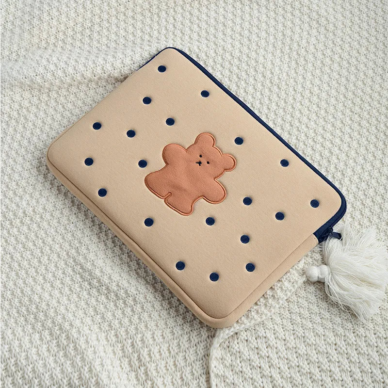 Polyester laptop sleeve with colourful embroidered animal design for a 15.6-inch laptop.
