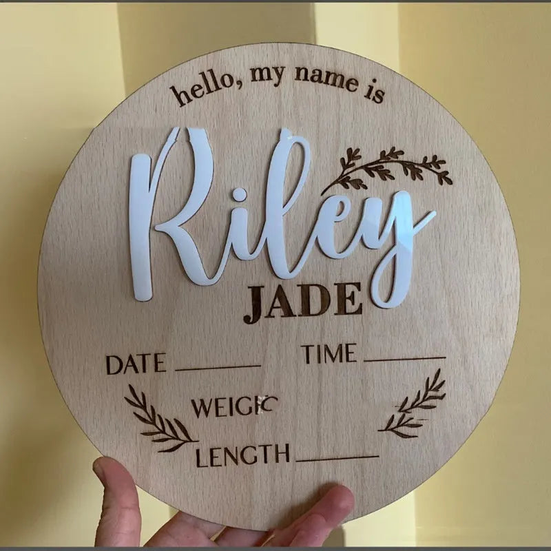 Square plywood name label with baby birth information, 15cm by 15cm, for nursery decoration.