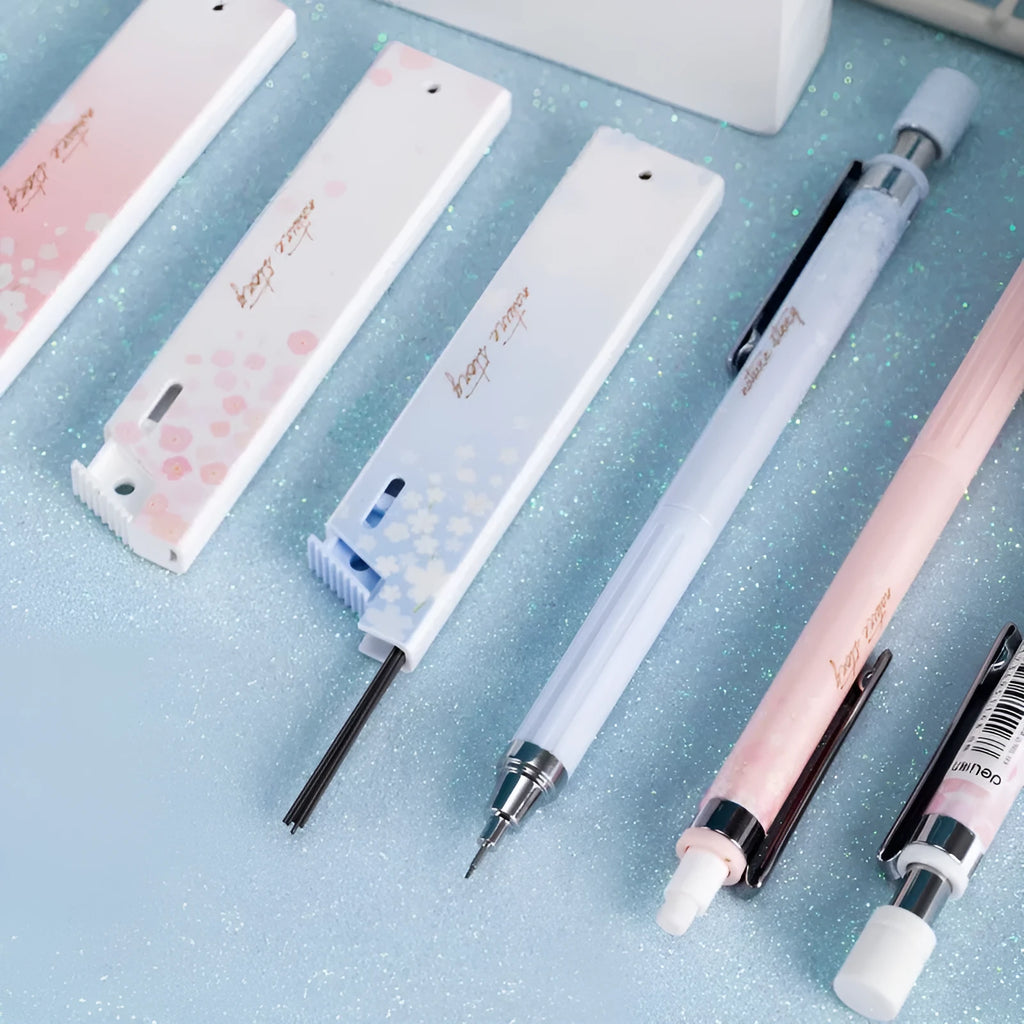 Set of three 0.5mm automatic cartoon pencils with HB lead refills in mixed colours.