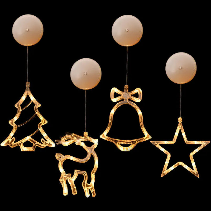 LED suction cup chandelier with Santa Claus, elk, and snowman shapes hanging on a window