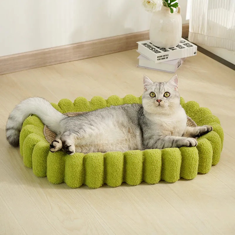 Green oval cat scratch pad bowl with sisal surface measuring 65cm